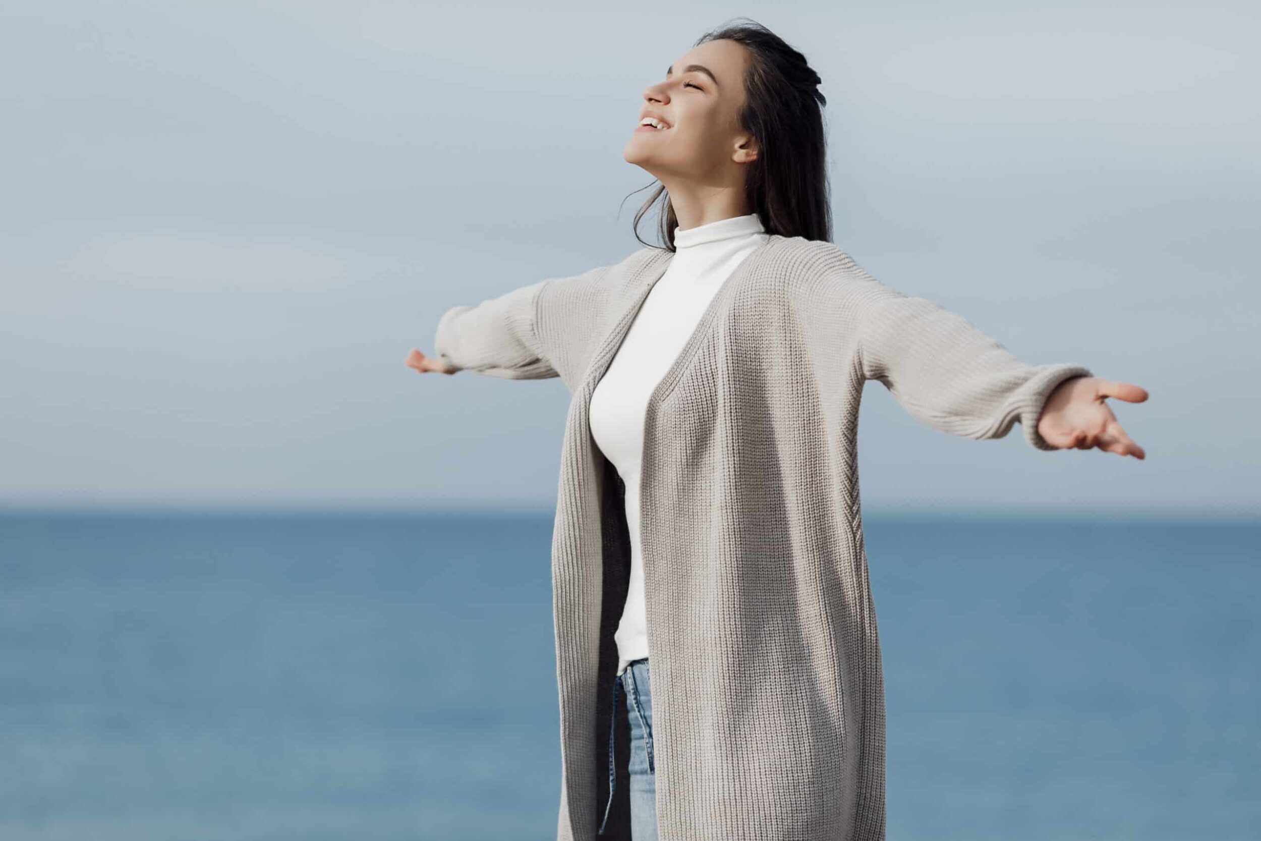 Young woman smiling and feeling free after expunging her criminal record in Missouri